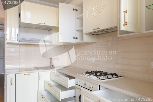 Image of Classic cream colored kitchen