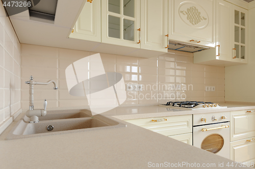 Image of Classic cream colored kitchen closeup