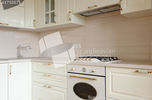 Image of Classic cream colored kitchen closeup