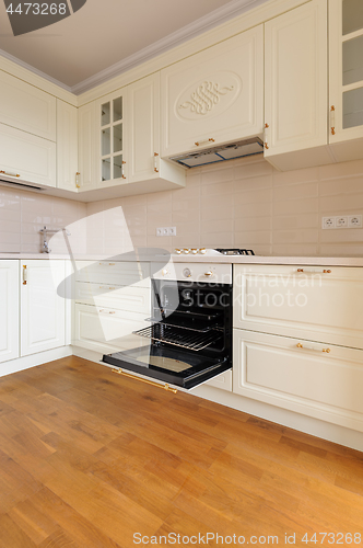 Image of Classic cream colored kitchen