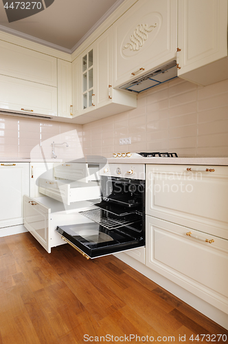 Image of Classic cream colored kitchen