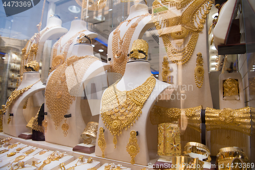 Image of gold jewelry in the shop window