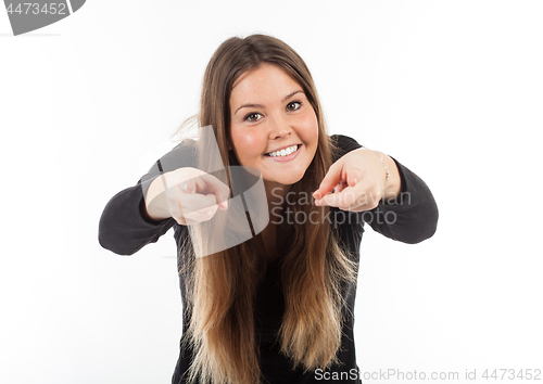 Image of Beautiful young woman showing blank signboard