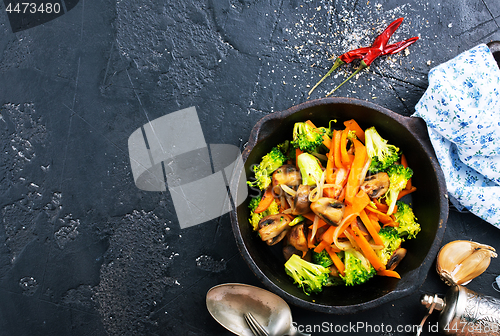 Image of fried mushrooms with vegetables