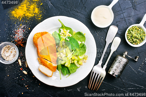 Image of chicken breast with salad