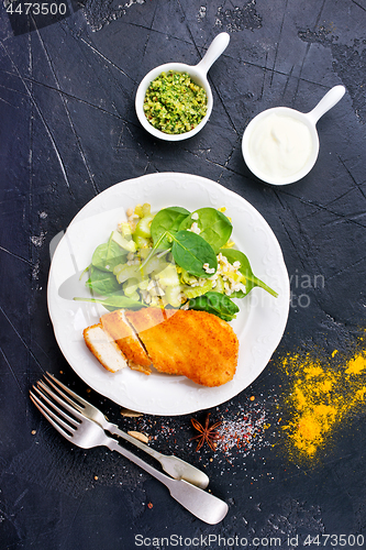 Image of chicken breast with salad