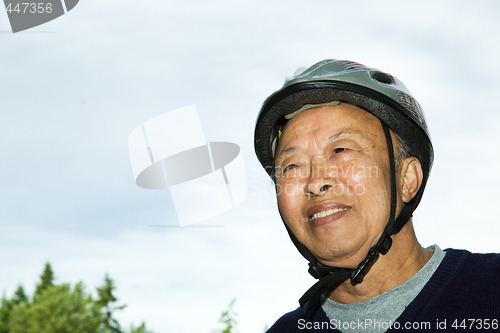 Image of Active senior asian man