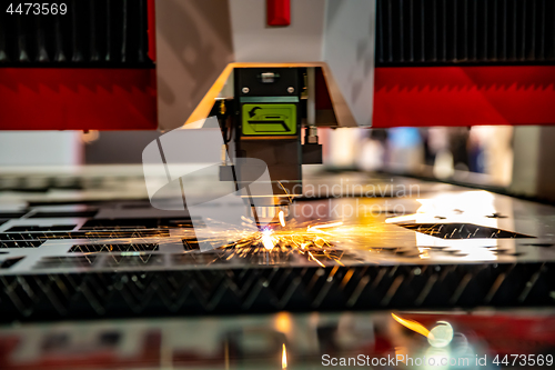 Image of CNC Laser cutting of metal, modern industrial technology.