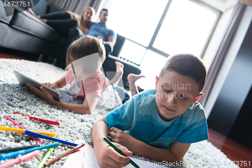 Image of young couple spending time with kids