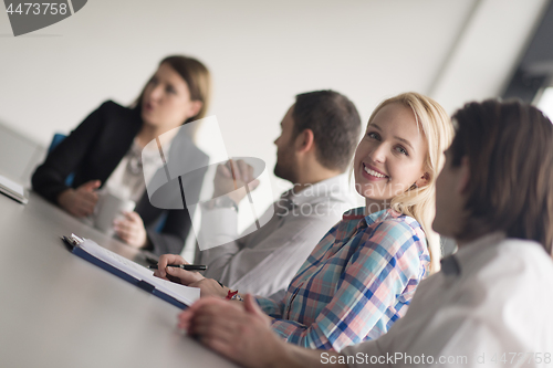 Image of Group of young people meeting in startup office