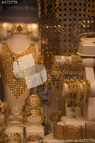 Image of gold jewelry in the shop window