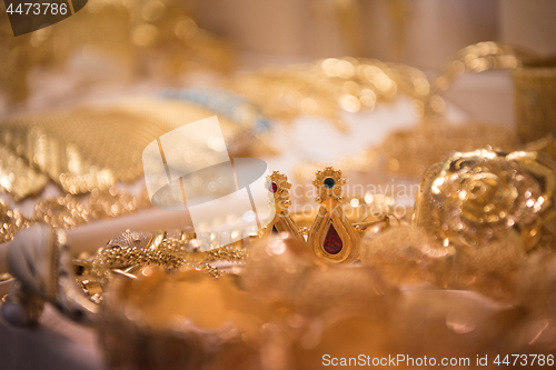 Image of gold jewelry in the shop window