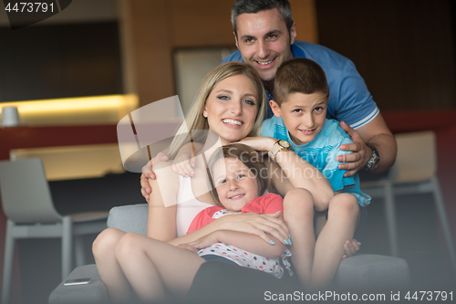 Image of couple spending time with kids