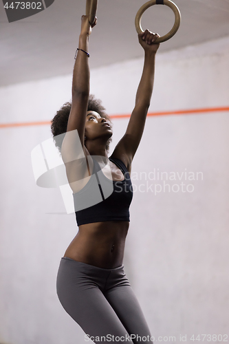 Image of black woman doing dipping exercise