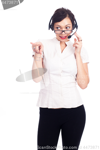 Image of Beautiful young call-center assistant smiling , isolated on white