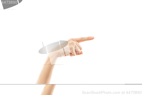 Image of hand of woman showing a direction