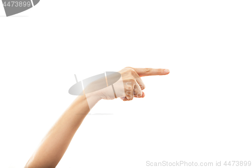 Image of hand of woman showing a direction