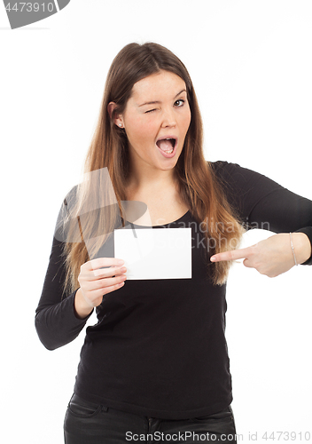 Image of Beautiful young woman showing blank signboard