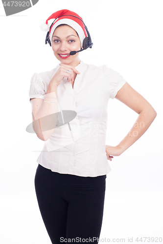 Image of Pretty phone operator in Santa hat isolated over white