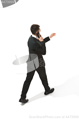 Image of The back of businessman over white background