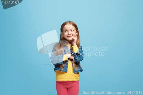 Image of Young serious thoughtful teen girl. Doubt concept.