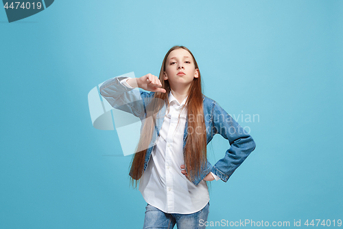 Image of Young serious thoughtful teen girl. Doubt concept.