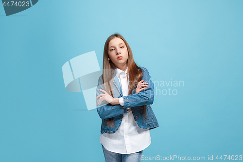 Image of Young serious thoughtful teen girl. Doubt concept.