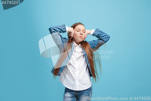 Image of Beautiful woman in stress isolated on blue