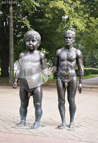 Image of ESTONIA, TARTU - AUGUST 18, 2014 - Father and son sculpture