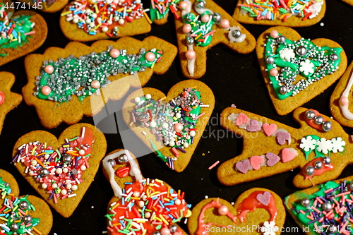 Image of Homemade christmas cookies on a dark table