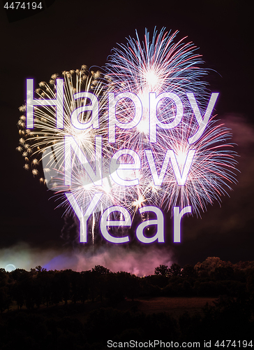 Image of Happy New Year with fireworks