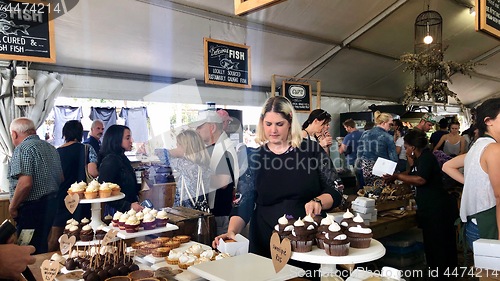 Image of Booth selling delicious sweets at a Neighbourgoods Market at the waterfront of Cape Town, South Africa.