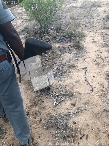 Image of Safari guide with his rifle in the bush of South Africa