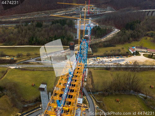 Image of Aerial of a complex new railway bridge construction between two tunnels