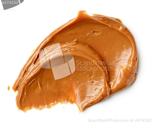 Image of melted caramel on a white background