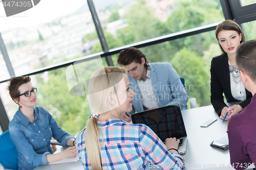 Image of Business Team At A Meeting at modern office building