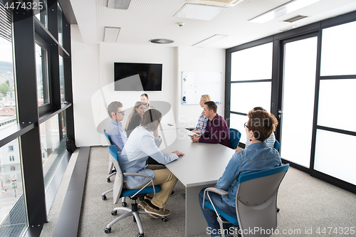 Image of Business Team At A Meeting at modern office building