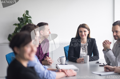 Image of Group of young people meeting in startup office