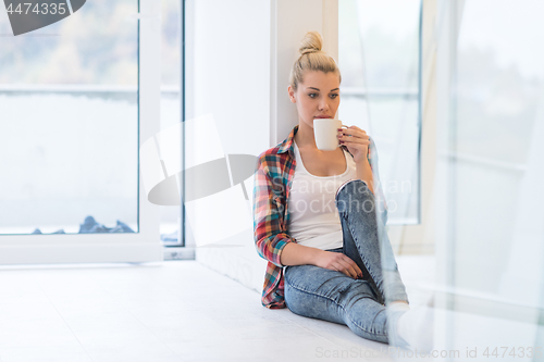 Image of Portrait of a beautiful girl on the floor