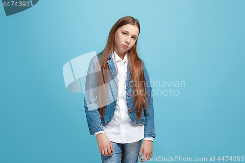 Image of Young serious thoughtful teen girl. Doubt concept.