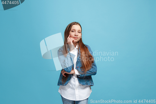 Image of Young serious thoughtful teen girl. Doubt concept.