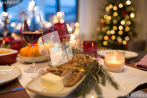 Image of bread slices and other food on christmas table