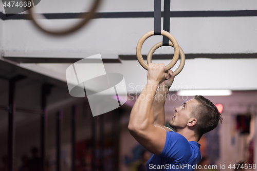 Image of man doing dipping exercise