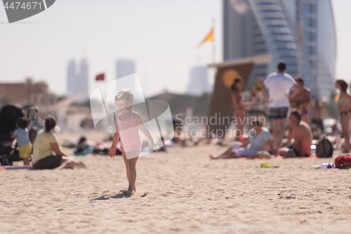 Image of little cute girl at beach