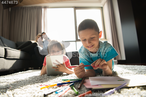 Image of young couple spending time with kids