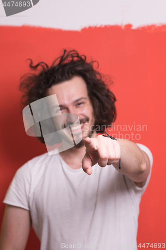 Image of young man with funny hair over color background