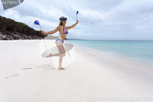 Image of Patriotic aussie girl on beach 