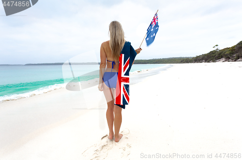 Image of Aussie girl waving a flag travel tourism Australia