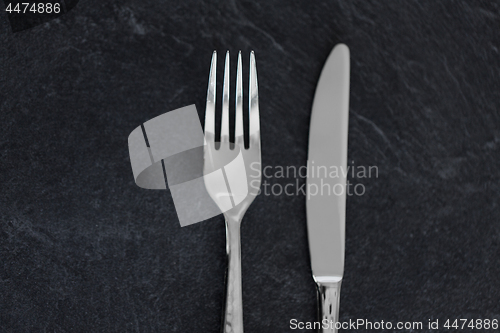 Image of close up of fork and knife on table