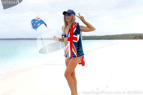 Image of Australian beach cuture bikini woman with Australian flag paraphernalia